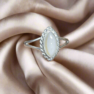 pearl shimmer breastmilk ring with lock of hair