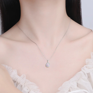 The Cherish Teardrop Breastmilk Pendant on model