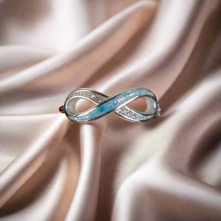 Infinity breastmilk ring with light blue leaf