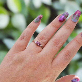 scale on hand Verity Ashes Inclusion ring