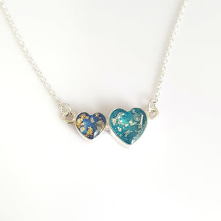small-midnight blue pearl and gold leaf large- turquoise pearl and silver leaf
