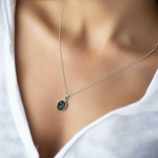 black pearl Little Oval Ashes Pendant on model