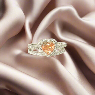 Zara ashes ring with ruby leaf